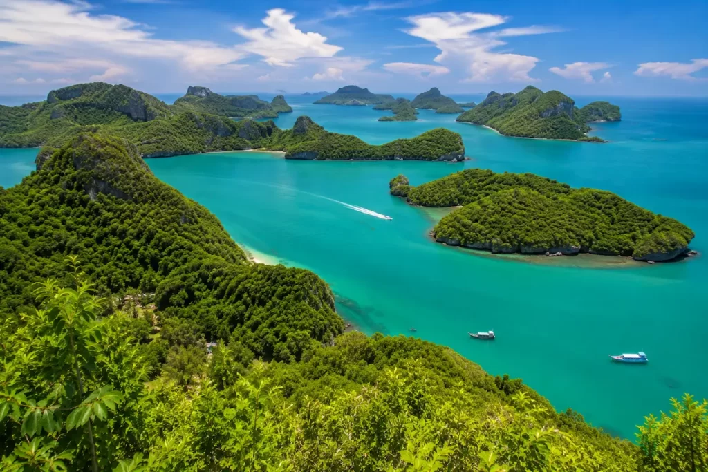 Panoramic view of Ang Thong National Marine Park, one of the must-see attractions in Southern Thailand, featuring emerald islands and turquoise waters.