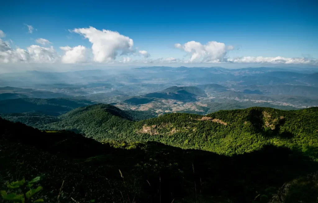 Must see attractions Thailand featuring panoramic mountain views across Doi Inthanon National Park in northern Thailand.