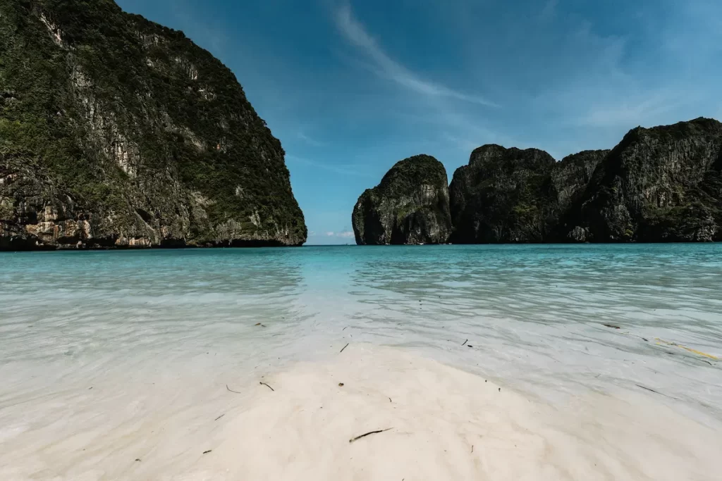 Maya Bay surrounded by limestone cliffs on Phi Phi Leh in Krabi, Thailand