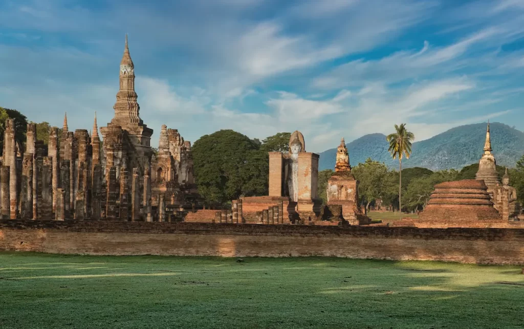 Must see attractions Thailand featuring the ancient temple ruins of Sukhothai Historical Park, a UNESCO World Heritage Site.