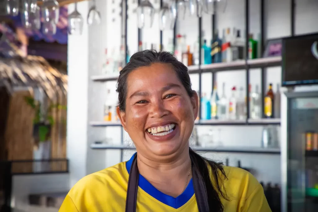 Why visit Thailand? Friendly Thai local welcoming visitors with the warm hospitality that makes Thailand the Land of Smiles.