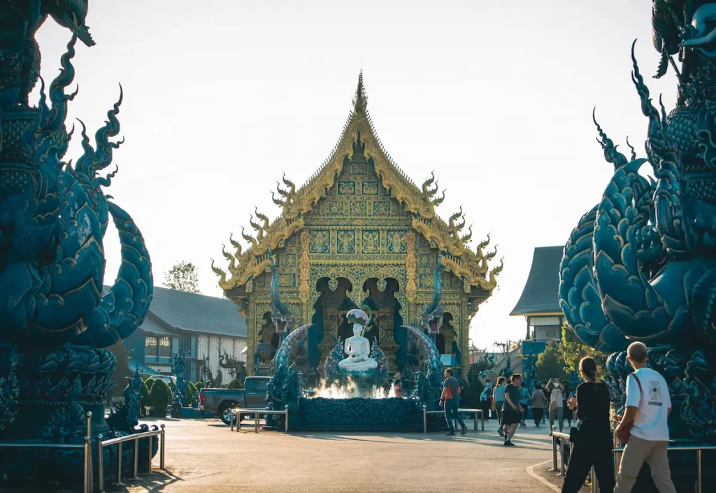 Wat Rong Suea Ten (Blue Temple) in Chiang Rai, one of the best temples in Thailand, featuring its blue naga sculptures and white Buddha