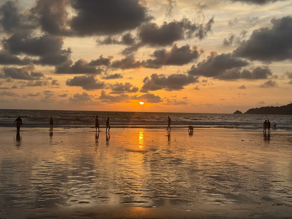 Best time to visit Patong with sunset over Patong Beach during the green season in Phuket