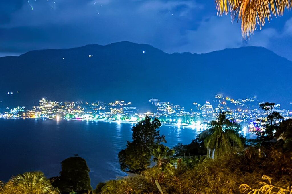 Night view over Patong Bay from a scenic viewpoint, one of the best free things to do in Patong.