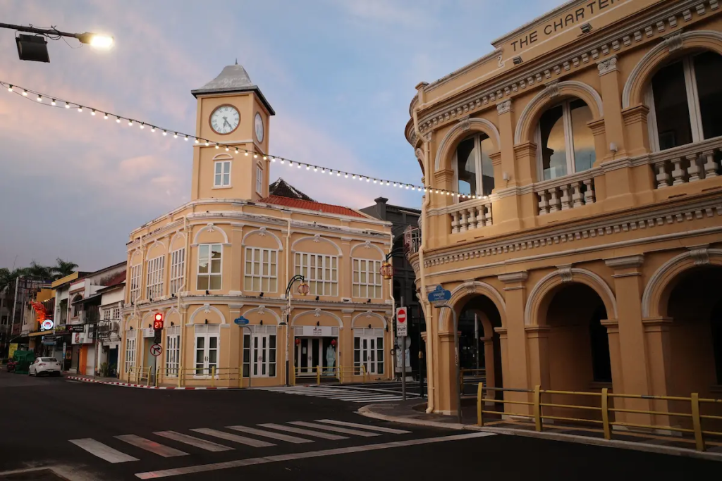 Travel With Insight photograph of Phuket Old Town featuring historic Sino-Portuguese architecture at sunset