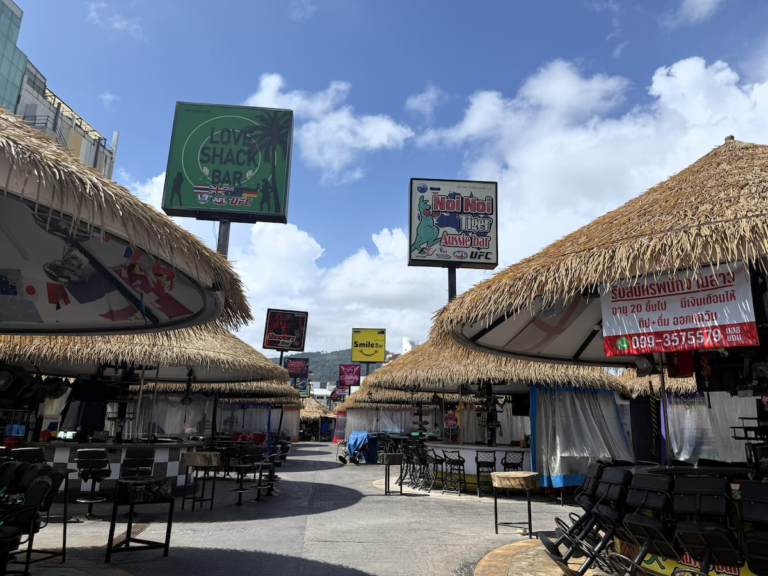 OTOP Patong open-air bar and shopping precinct under a blue sky.
