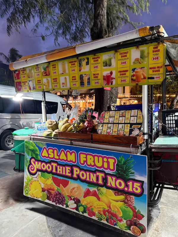 Fresh fruit smoothie stall along Patong Beach featured in our Patong Travel Guide.