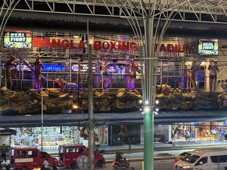 Patong Boxing Stadiums guide featuring Bangla Boxing Stadium in central Patong, Phuket at night.