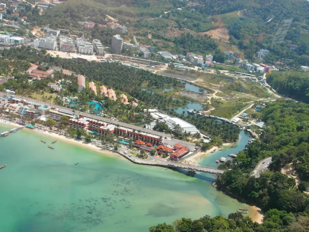 Aerial photograph of Patong Creek and the surrounding coastal plain in Phuket showing the creek mouth, wetlands and modern development in 2014.