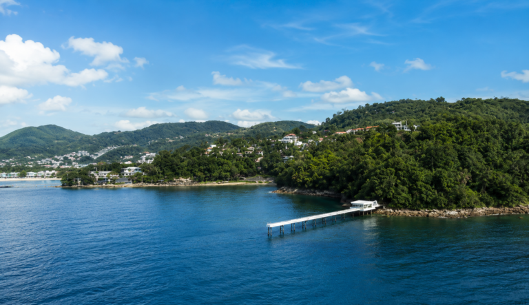 Tri Trang Headland Area Patong Visitor Guide showing the forested coastal headland, sea-view hotels and the Andaman Sea south of Patong Beach, Phuket.