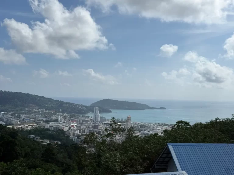 Panoramic view of Patong Beach and Patong Bay from Wat Doi Thep Nimit in Phuket.