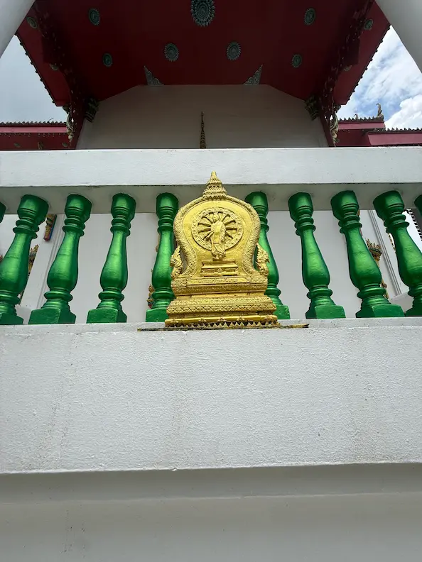 Bai sema incorporated into the ubosot balustrade at Wat Suwan Khiri Wong Patong