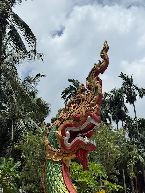 Decorative naga head beside the staircase at Wat Suwan Khiri Wong Patong