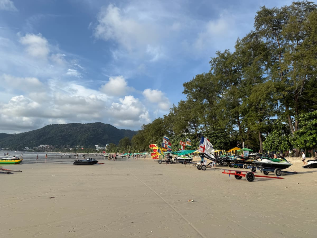 Water sports on Patong Beach including jet skis, parasailing and a banana boat for a guide to how much a holiday in Patong costs.