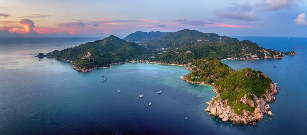 Aerial view of Koh Tao’s rocky coastline and turquoise bays, one of the best islands in Southern Thailand