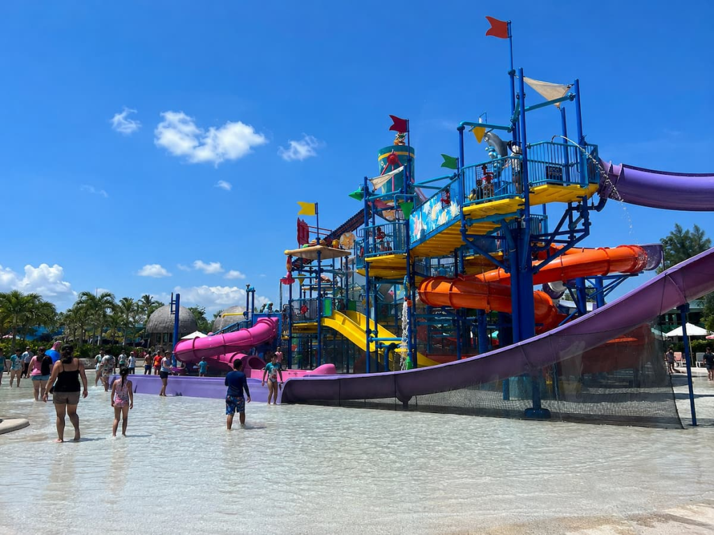 Families enjoying the children’s slides and water-play area at Andamanda Phuket.