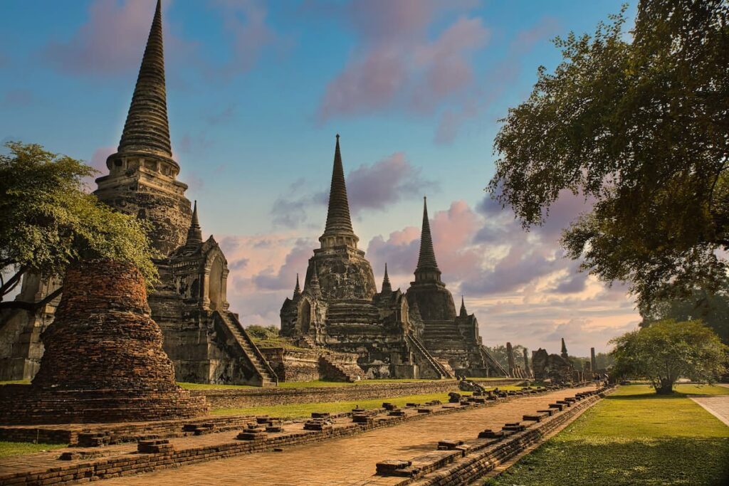 Ancient chedis at Ayutthaya Historical Park featured in a guide to where to go in Central Thailand.