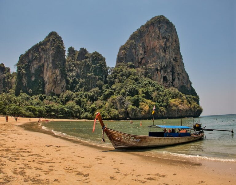 Longtail boat beside Railay Beach, one of the best beaches in Southern Thailand
