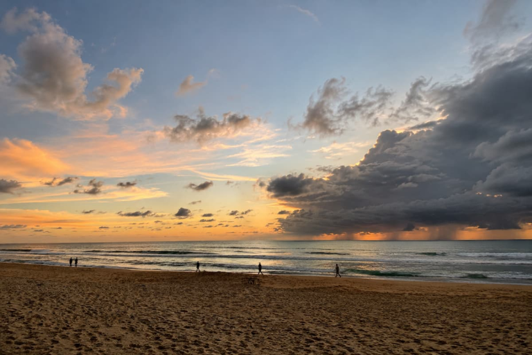 Best time to visit Phuket with changing weather over Karon Beach