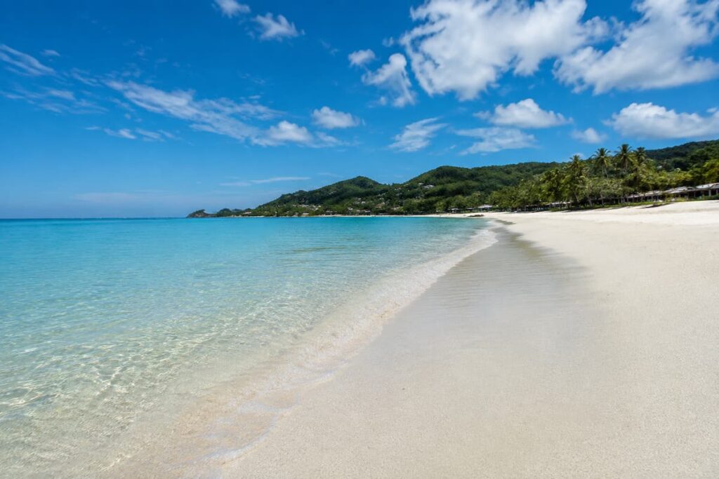 White sand and clear blue water at Chaweng Beach on Koh Samui, Thailand