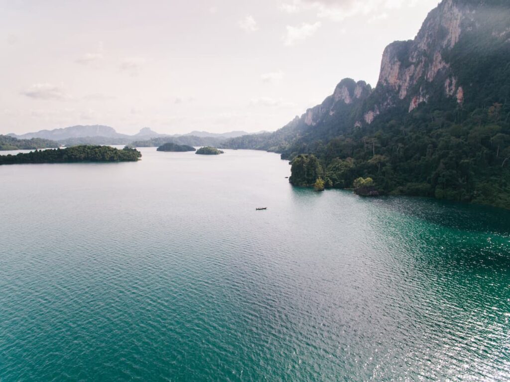 Cheow Lan Lake and limestone mountains in Khao Sok National Park, one of the best national parks in Thailand
