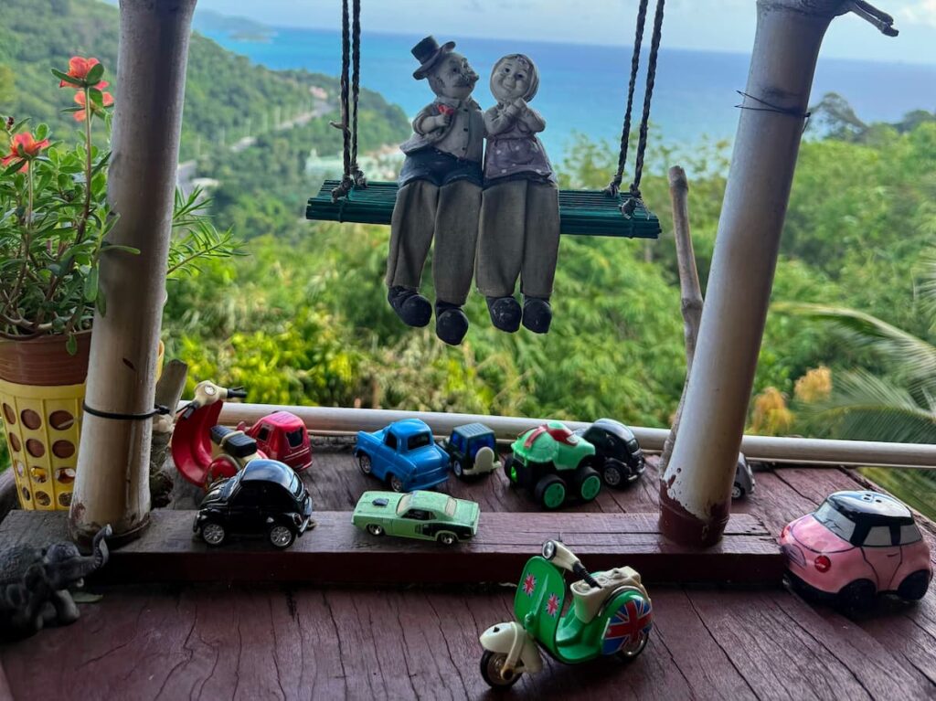 Quirky handmade decorations overlooking the sea at Grandma Homemade Thai Food near Patong