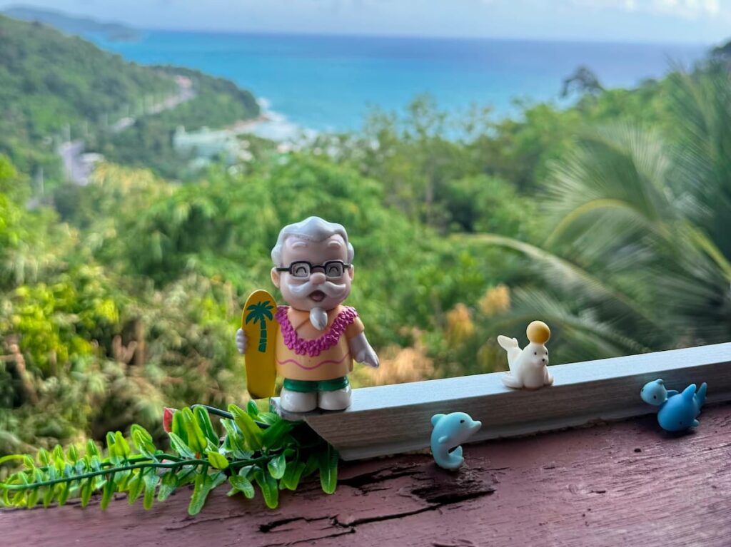 Playful decorations and tropical sea view at Grandma Homemade Thai Food near Patong