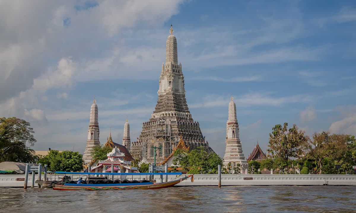 Historical places in Thailand featuring Wat Arun beside the Chao Phraya River in Bangkok