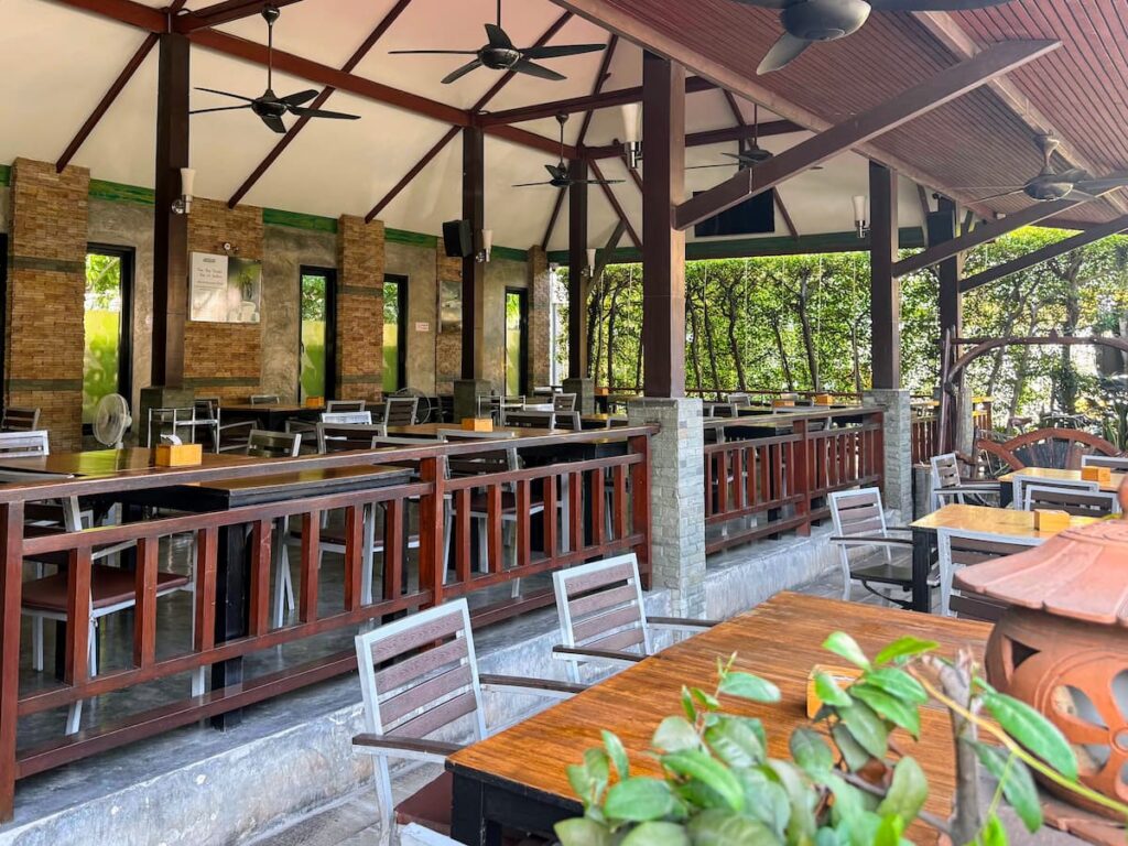 Open-air dining area at Kaab Gluay Thai Restaurant featured in our Patong Travel Guide, Phuket.