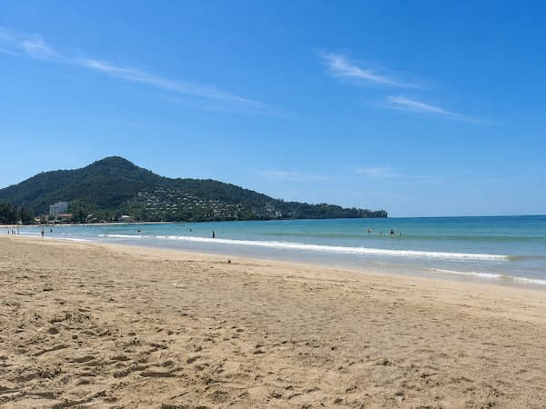 Kamala Beach and its forested headland featured in a Phuket travel guide to the island’s principal destinations