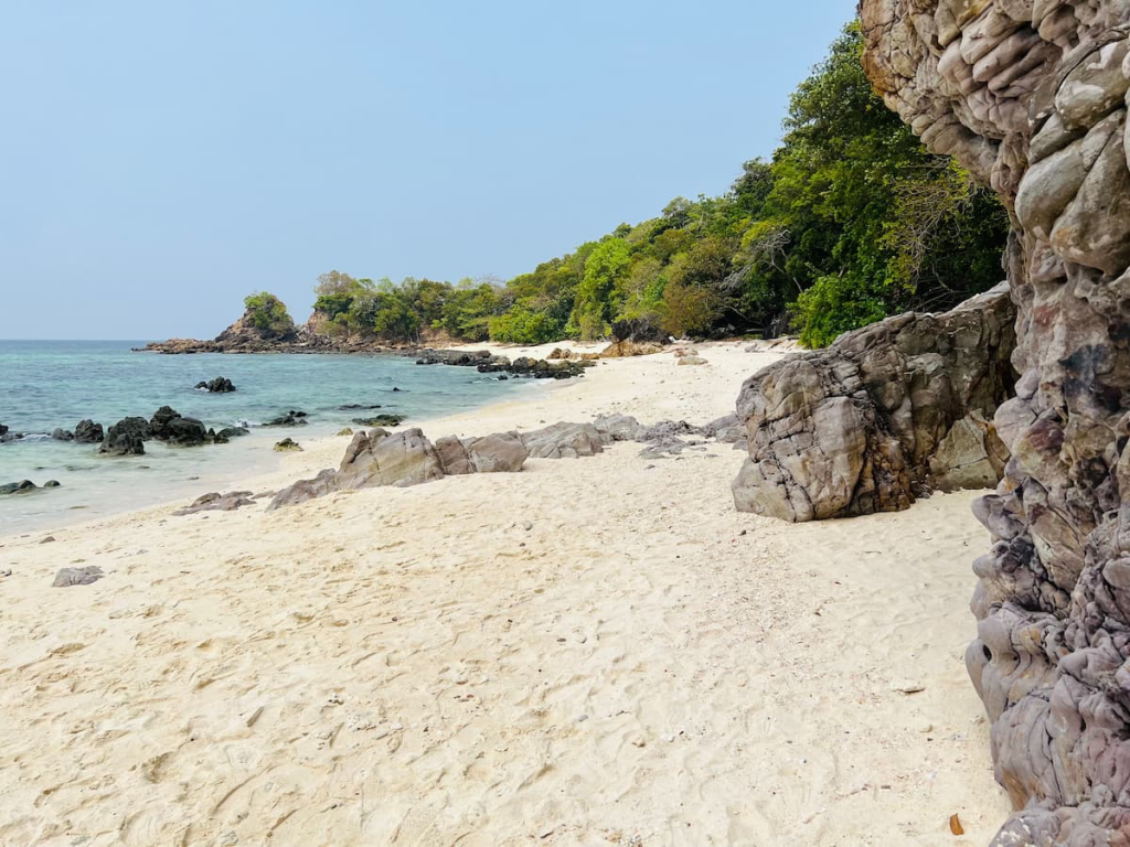Quiet beach and rocky coastline on Ko Khai in Tarutao National Marine Park, one of the best national parks in Southern Thailand.
