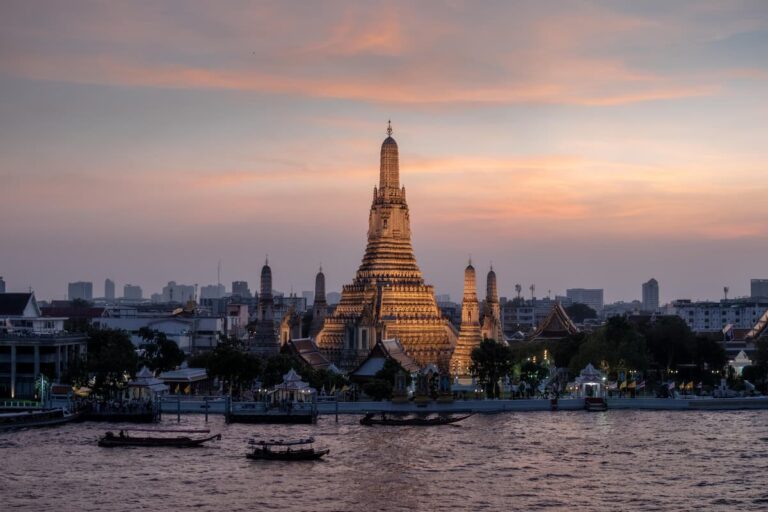Wat Arun beside the Chao Phraya River in Bangkok, one of the most popular destinations in Thailand.