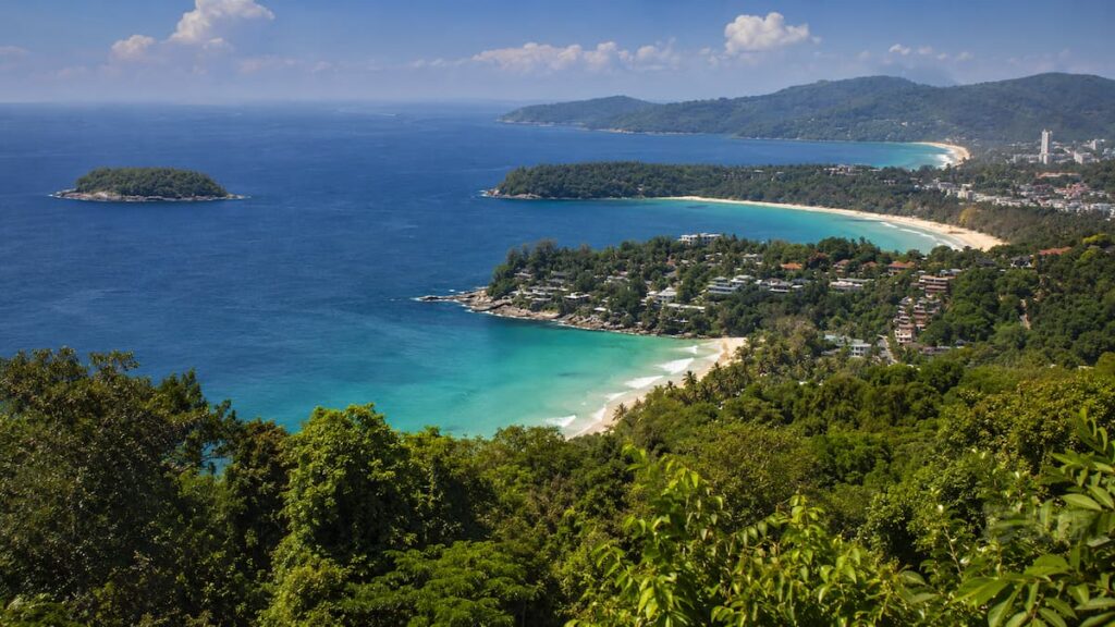 Elevated view across Phuket’s tropical beaches, forested headlands and small offshore islands.