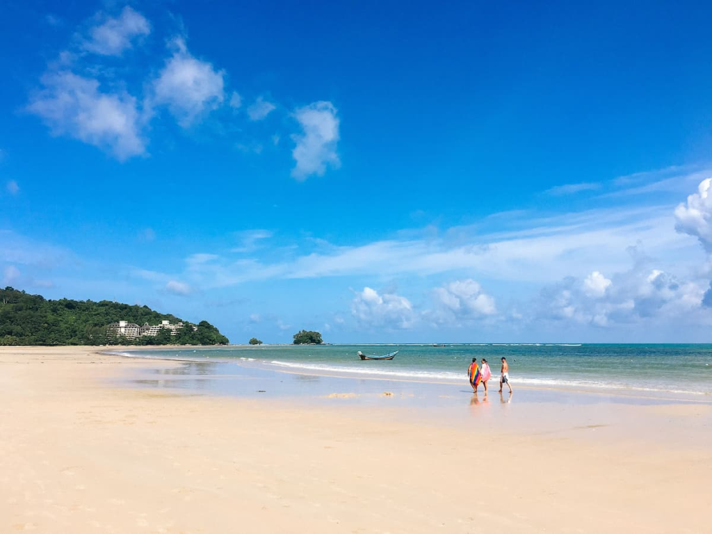 Karon Beach during Phuket’s dry season with blue skies and calm sea conditions