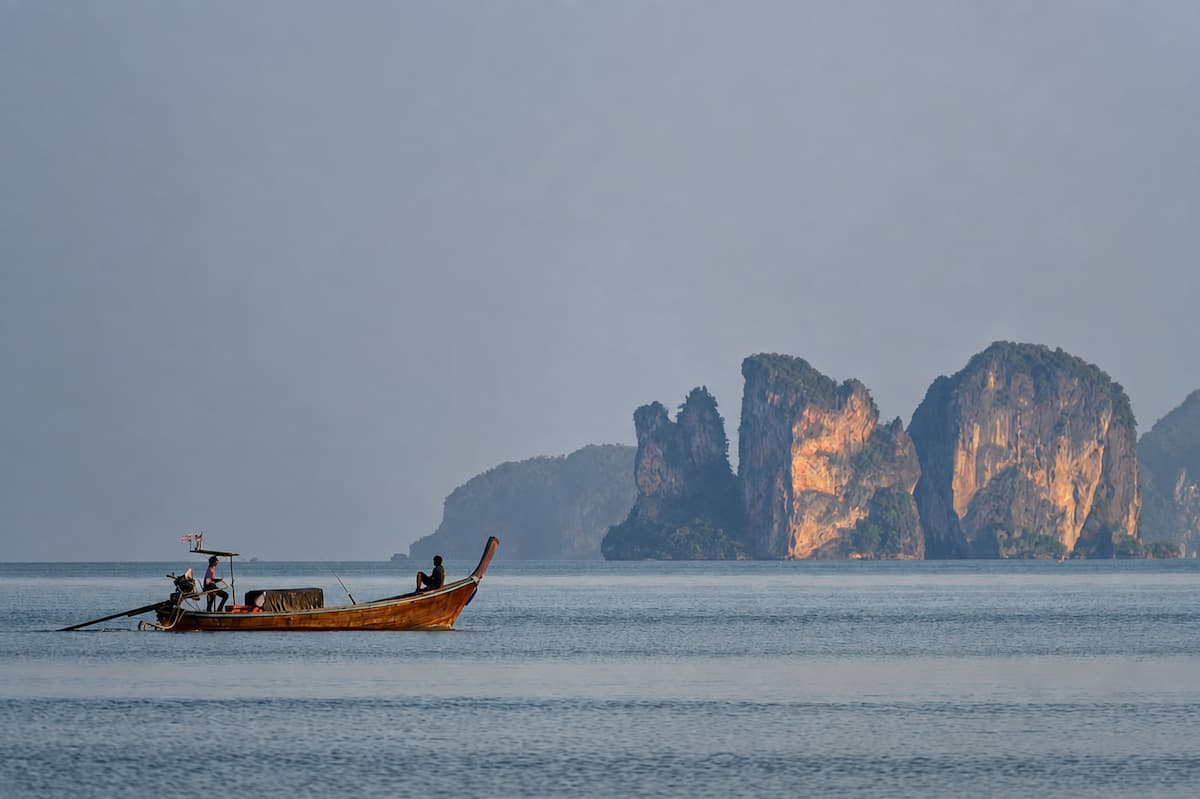 Longtail boat crossing the Andaman Sea during a Southern Thailand holiday