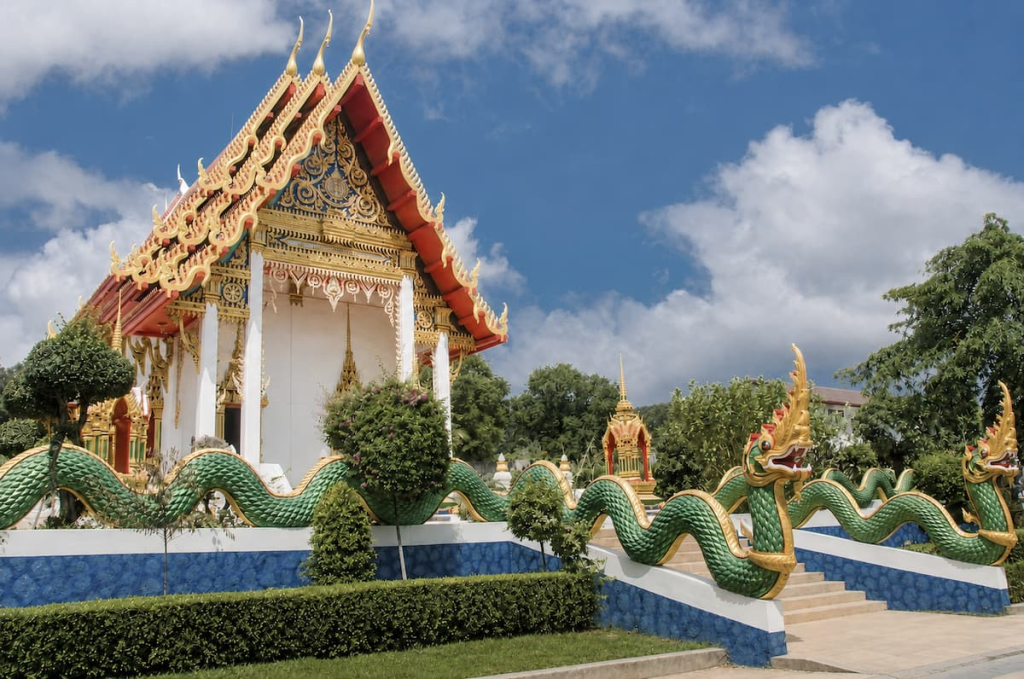 Wat Suwan Khiri Khet temple and naga entrance featured in our Karon Travel Guide to Phuket.