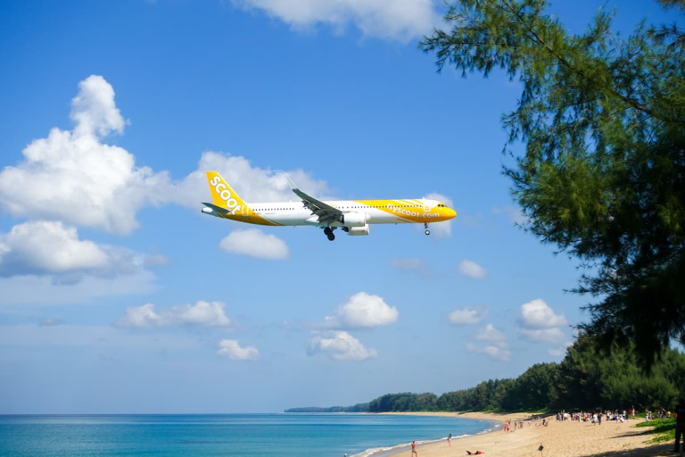 Getting to Phuket by air with a passenger flight approaching Phuket International Airport