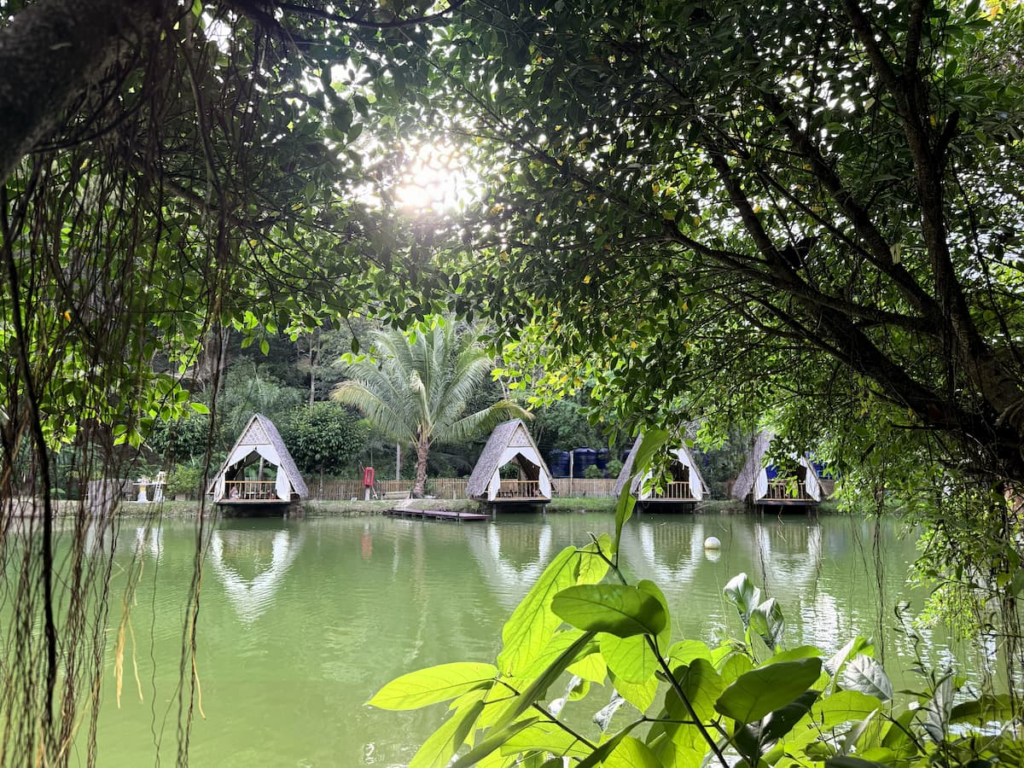 Peaceful lake and dining huts at Lob Mhum Patong in Patong