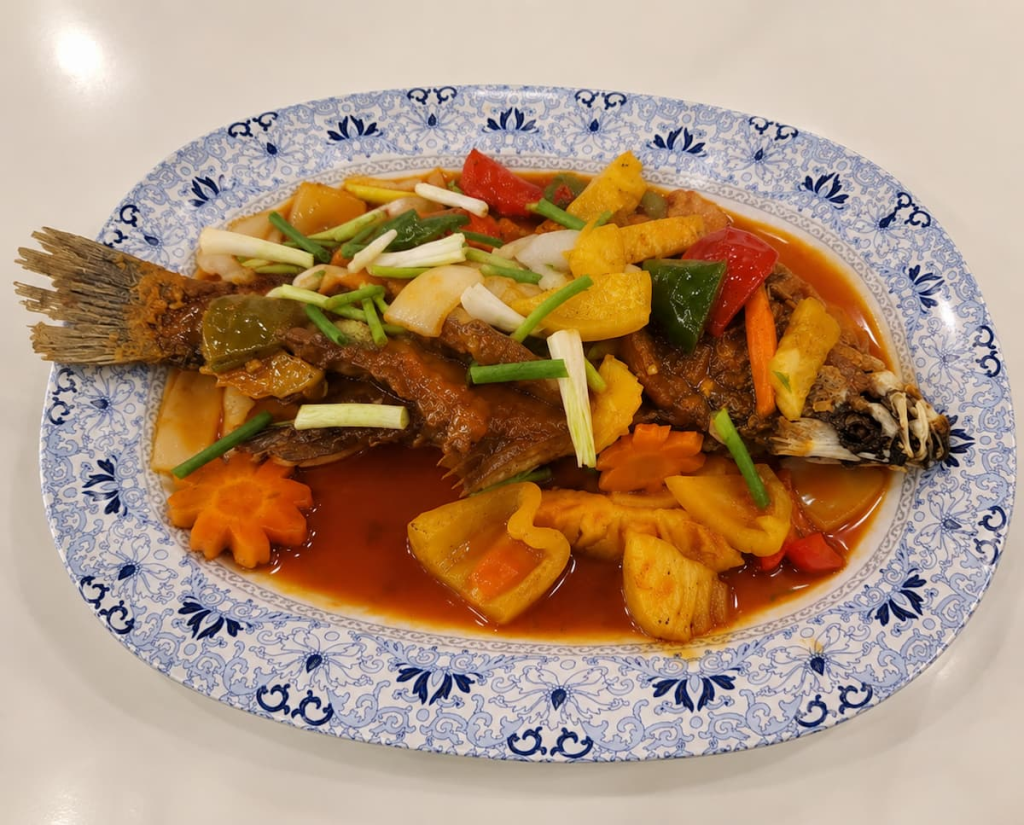 Whole fried fish with sweet-and-sour sauce, pineapple and vegetables at SIAM Phuket Seafood in Patong.