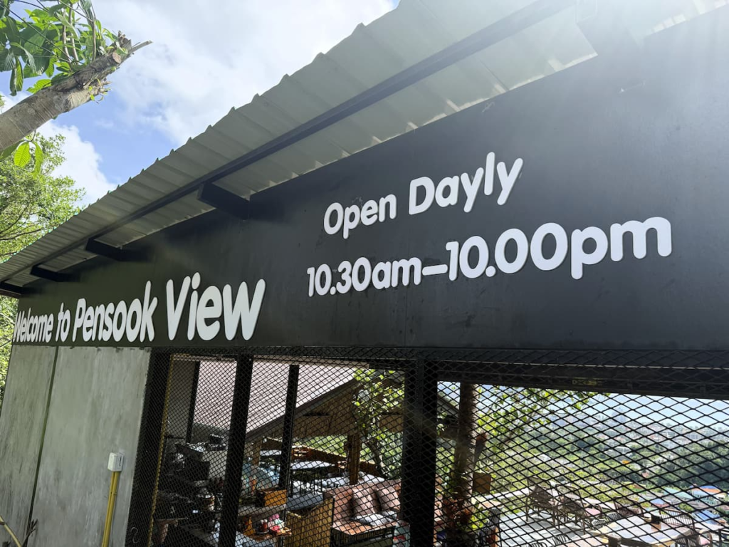 Pensook View Cafe opening hours sign showing 10:30 am to 10:00 pm